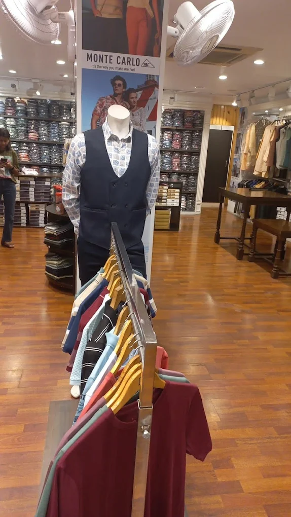 Mannequin display of premium suits and styling at K. Sons